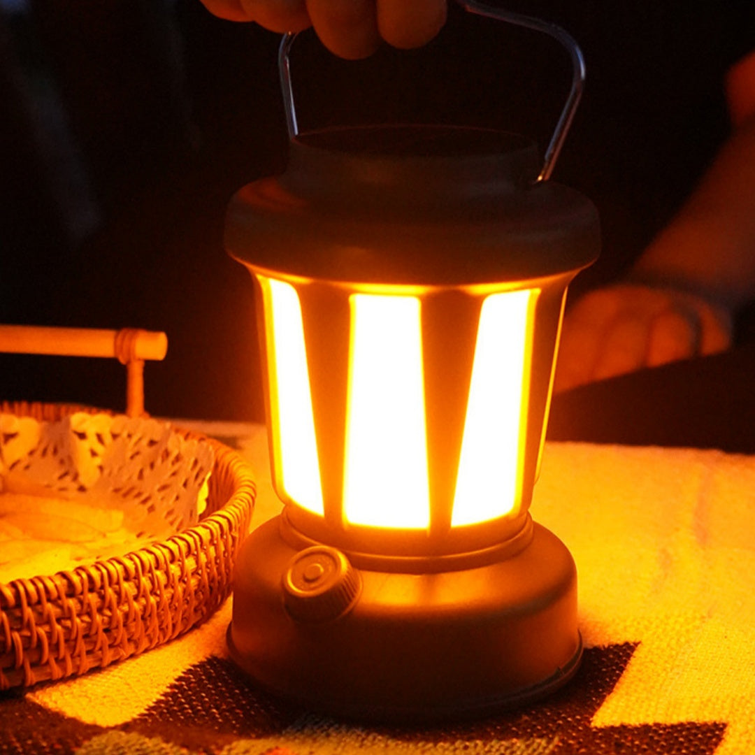 Solar Rechargeable Camping Lantern – Vintage LED Tent Light for Camping & Emergencies Lit on a table